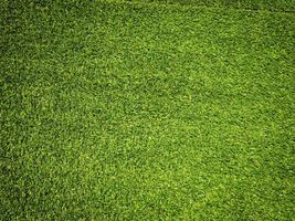 artificiell gräs bakgrund för design, topp se foto