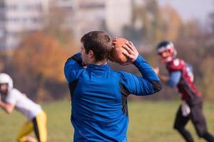 amerikan fotboll team med tränare i verkan foto