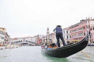 Venedig Italien, gondol förare i stor kanal foto