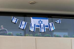 de blå och vit flagga av Israel med de sexuddig stjärna av david. foto