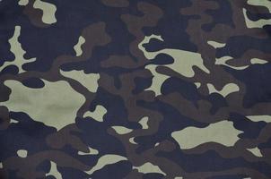 textil- mönster av militär kamouflage tyg foto