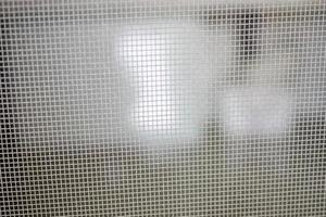 mygga netto tråd skärm stänga upp på hus fönster skydd mot insekt foto