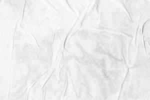 vit skrynkliga och skrynkligt papper affisch textur bakgrund foto