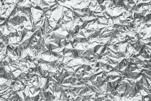 glänsande metall silvergrå folie skrynklig textur bakgrund foto