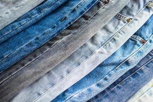 denim blå jeans stack textur bakgrund närbild foto