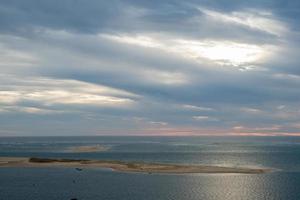 skön marinmålning på solnedgång sett från dyn på pilat. Frankrike foto