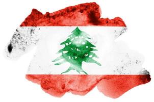 libanon flagga är avbildad i flytande vattenfärg stil isolerat på vit bakgrund foto