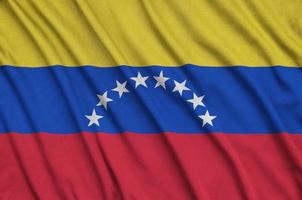 venezuela flagga är avbildad på en sporter trasa tyg med många veck. sport team baner foto