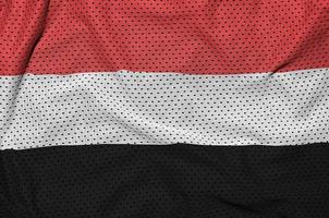 jemen flagga tryckt på en polyester nylon- sportkläder maska tyg w foto
