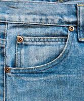 blå denim jeans ficka textur bakgrund närbild foto