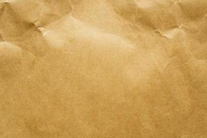 brun skrynkliga papper återvunnet kraft ark textur bakgrund foto