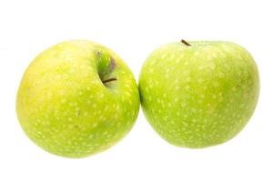 grönt äpple på vitt foto