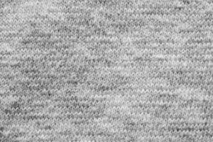 grå bomull skjorta tyg textur bakgrund foto