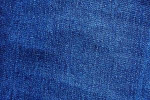denim blå jeans textur stänga upp bakgrund topp se foto