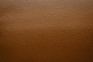 brun läder textur bakgrund stänga upp foto