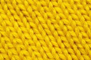 gul stickning ull textur bakgrund foto