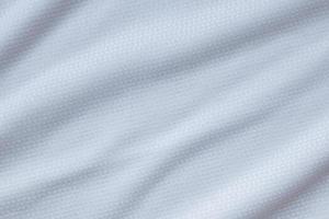 vit sporter Kläder tyg fotboll skjorta jersey textur bakgrund foto
