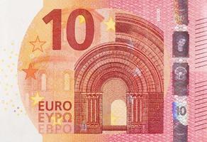 fragment del av 10 euro sedel närbild med små röd detaljer foto