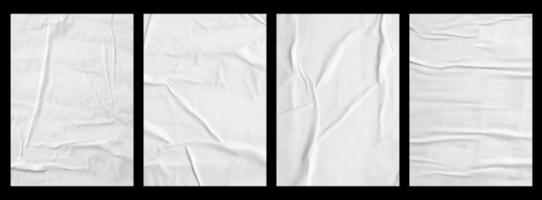 vit skrynkliga och skrynkligt papper affisch textur uppsättning isolerat på svart bakgrund foto