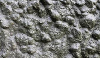 detaljvy på åldrade betongväggar med sprickor och mycket struktur i hög upplösning foto