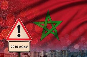 marocko flagga och coronavirus 2019-ncov varna tecken. begrepp av hög sannolikhet av ny coronavirus utbrott genom reser turister foto