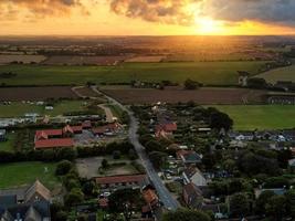 solnedgång på happisburgh by i norfolk foto