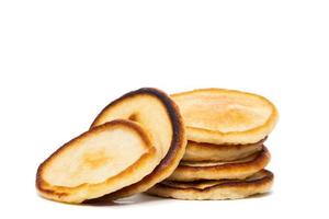 stack av gott pannkakor på vit bakgrund foto