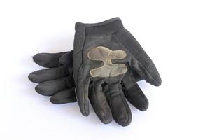 smutsig gammal svart handskar. foto