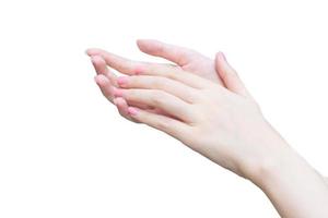 vacker kvinnlig hand, kvinnlig hand som applicerar lotion eller handkräm för handvård i spa- och manikyrkoncept. foto