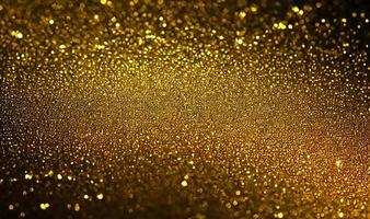guld glitter, guld partiklar stjärna på svart bakgrund. foto