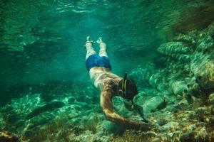 utforska under de vatten foto