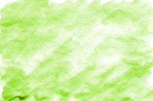ljus grön vattenfärg bakgrund på vit papper. för de text, texturer, banderoller, broschyrer, affischer, med Plats för inskriptioner. vattenfärg design element för webb dekoration foto