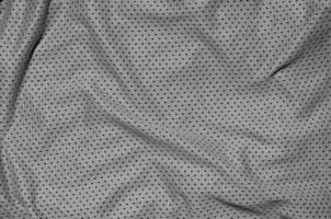 stänga upp av grå polyester nylon- sportkläder shorts till skapas en texturerad bakgrund foto