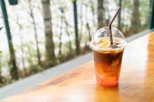espressokaffeshot med citronpersikaläsk foto