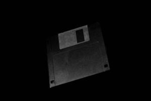 3.5 tum disk på mörk bakgrund foto