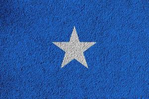 flagga av somalia texturerad bakgrund. begrepp collage. foto