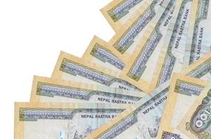 100 nepalesiska rupier räkningar lögner i annorlunda beställa isolerat på vit. lokal- bank eller pengar framställning begrepp foto