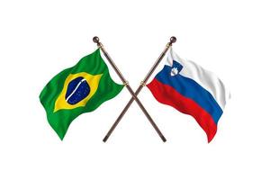 Brasilien mot slovenien två Land flaggor foto