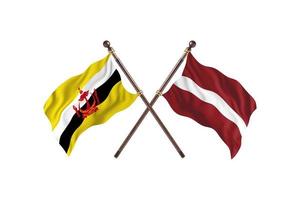 brunei mot lettland två Land flaggor foto
