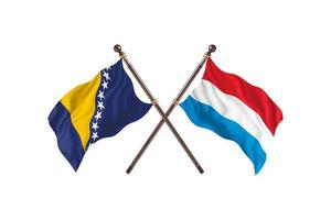 bosnien mot luxemburg två Land flaggor foto