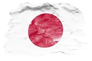 japan flagga är avbildad i flytande vattenfärg stil isolerat på vit bakgrund foto