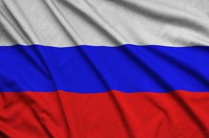 ryssland flagga är avbildad på en sporter trasa tyg med många veck. sport team baner foto