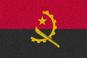 angola flagga på Frigolit textur foto
