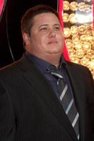 los angeles, nov 15 - chaz bono i kostym ankommer på de burlesk la premiär på grauman s kinesisk teater på november 15, 2010 i los angeles, ca foto