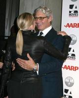 los angeles, feb 6 - sharon sten, michael nouri ankommer på de aarp s 11th årlig bio för klänningar utmärkelser på beverly wilshire hotell på februari 6, 2012 i beverly kullar, ca foto