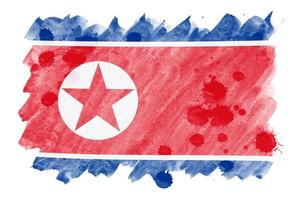 norr korea flagga är avbildad i flytande vattenfärg stil isolerat på vit bakgrund foto