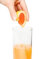 pressas röd grapefrukt juice foto