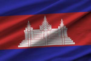 cambodia flagga med stor veck vinka stänga upp under de studio ljus inomhus. de officiell symboler och färger i baner foto