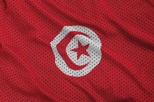 tunisien flagga tryckt på en polyester nylon- sportkläder maska tyg foto