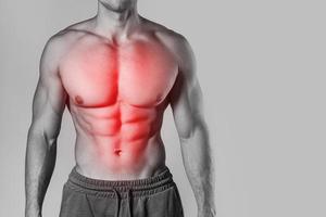 specialisering för bröst och abdominal muskler i de bodybuilding foto